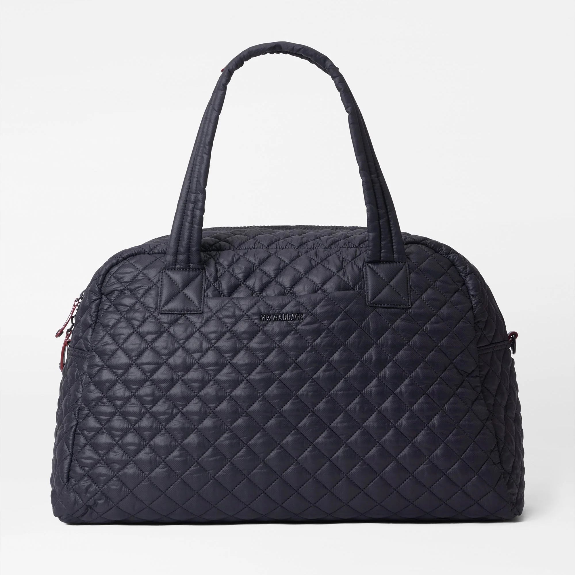 Roomy enough to hold everything you need for the gym or travel, but still light enough to carry when you're not using the luggage sleeve, the JIM will be your go-to for overnights, weekends, and work-outs!
