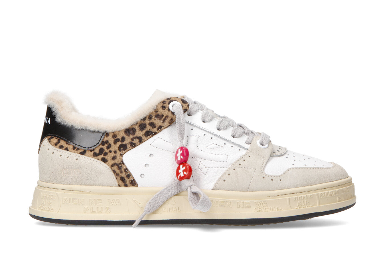 Ultra cool girl sneaker with a shearling lining and a leopard highlight.    Leather/suede combo.
